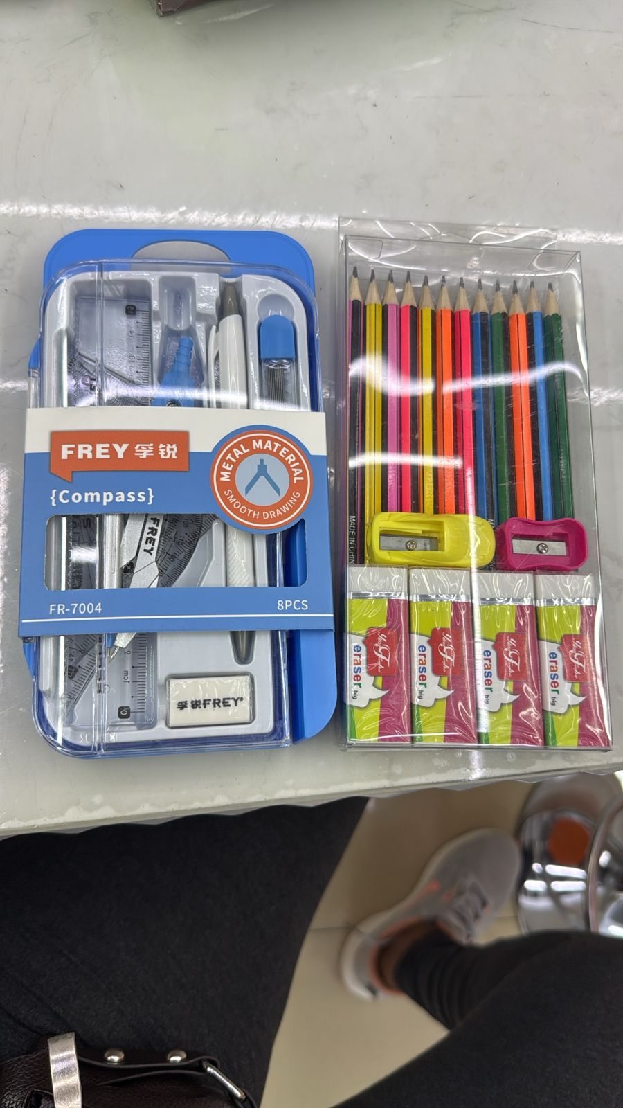 A unique geometrical set, pack of 12 pencils, 4 erasers and 2 sharpeners