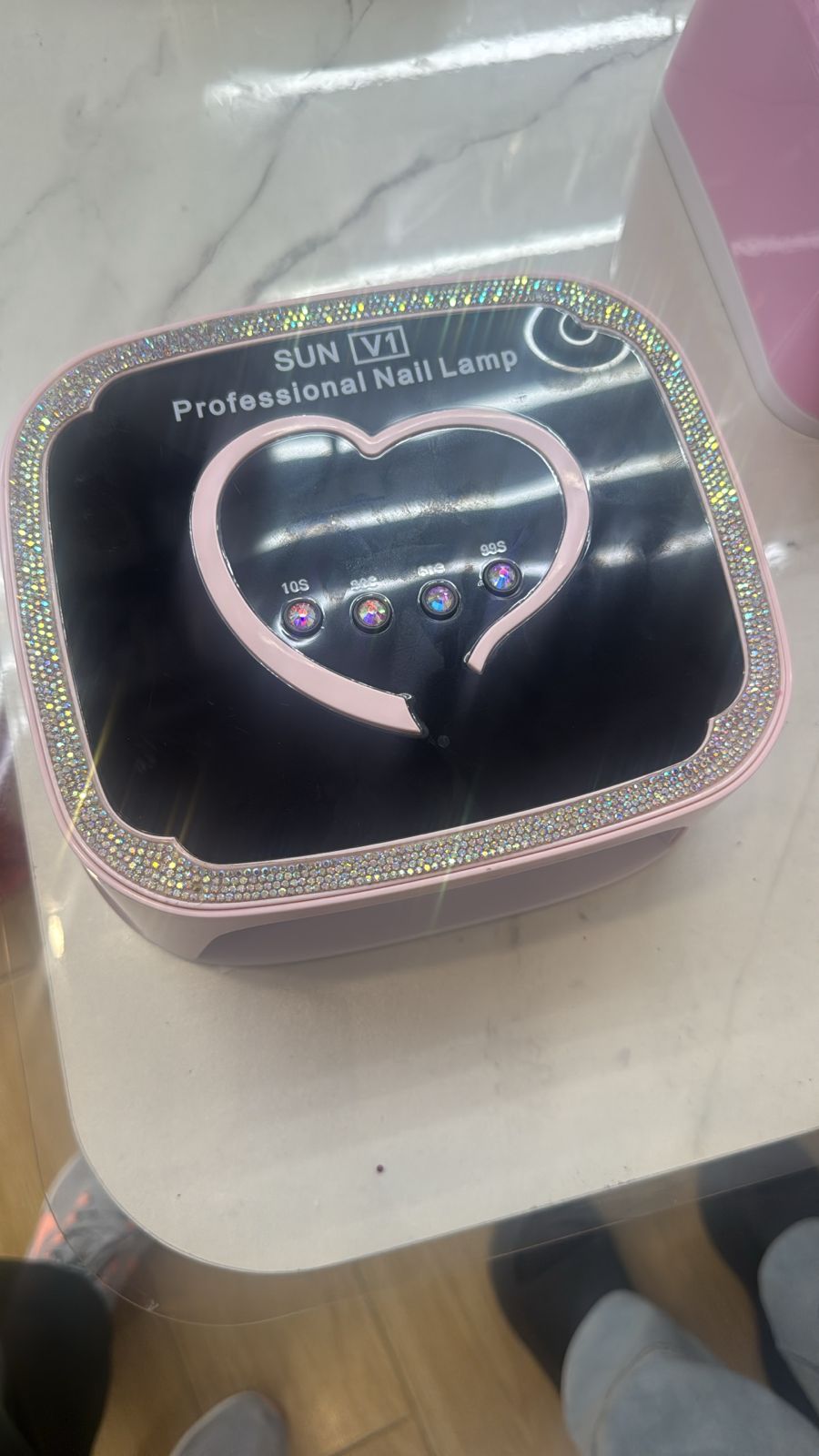 rechargeable original nails UV light. (essential for curing gel nail polish, transforming it into a hard, durable finish.)