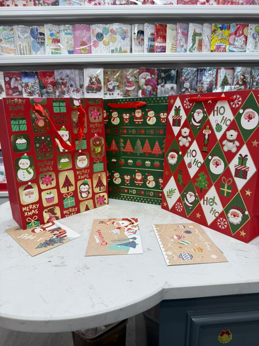 A4 Christmas themed gift bags available set of 3 with cards
