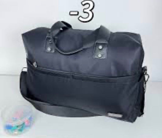 Black traveling duffel bag